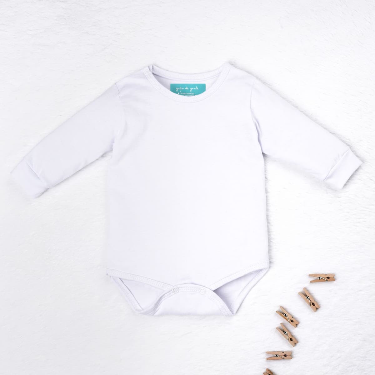 https://gdg-images.s3.sa-east-1.amazonaws.com/fotos/151682/body-manga-longa-baby-basics-branco-tam-p-329615.jpg