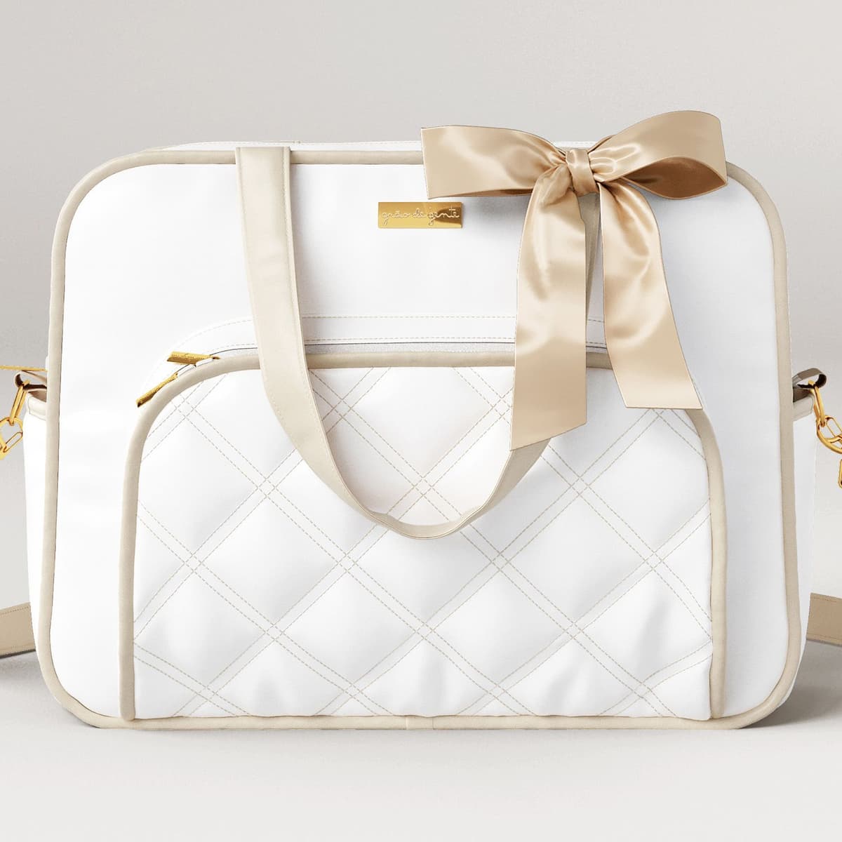 https://gdg-images.s3.sa-east-1.amazonaws.com/fotos/157339/bolsa-maternidade-branco-e-bege-luxo-40cm-351434.jpg