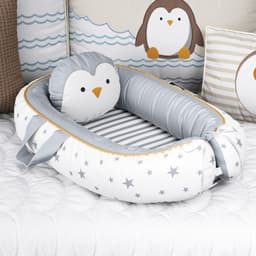 https://gdg-images.s3.sa-east-1.amazonaws.com/fotos/138571/ninho-para-bebe-redutor-de-berco-pinguim-estrelinha-305656.jpg